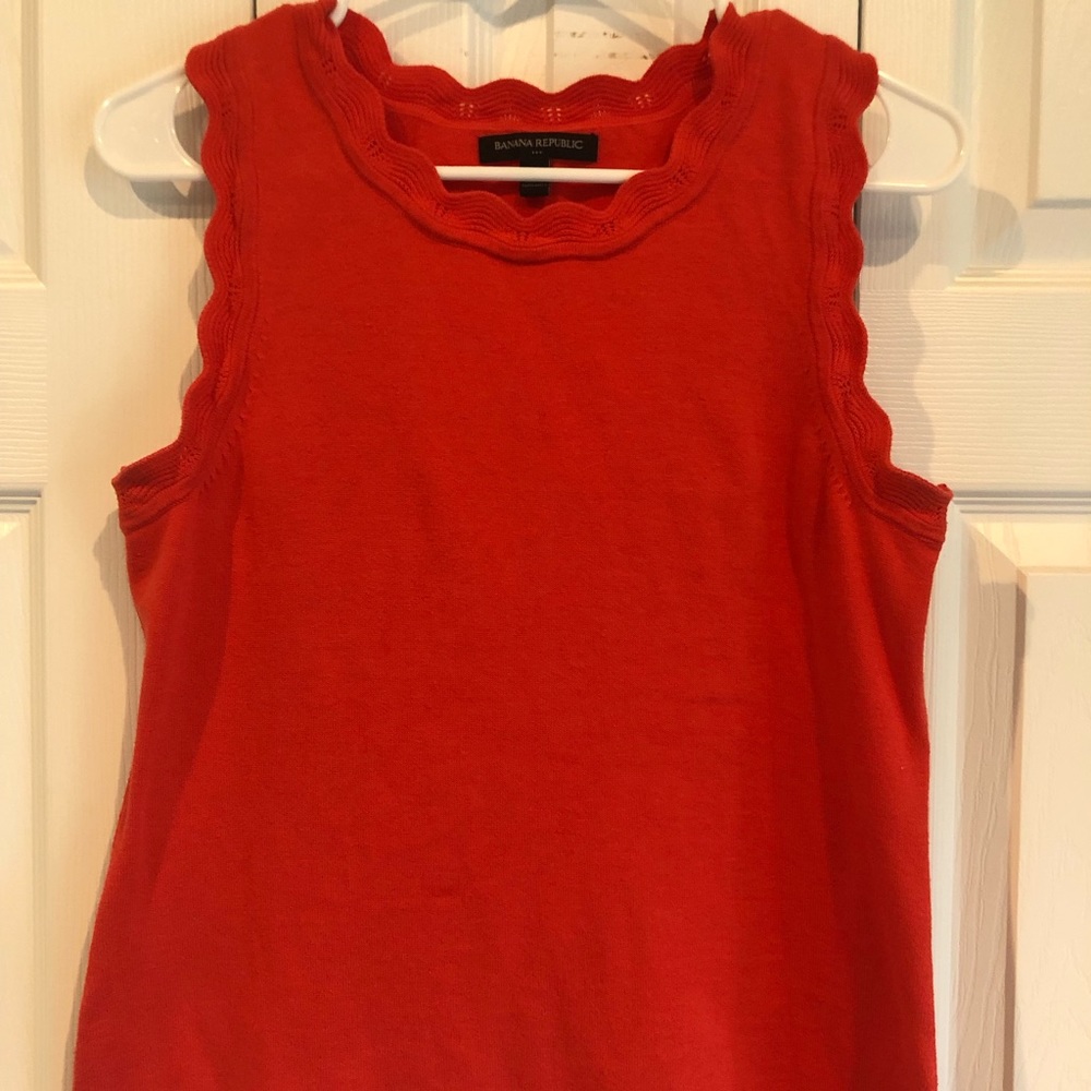 Sleeveless sweater in autumn orange